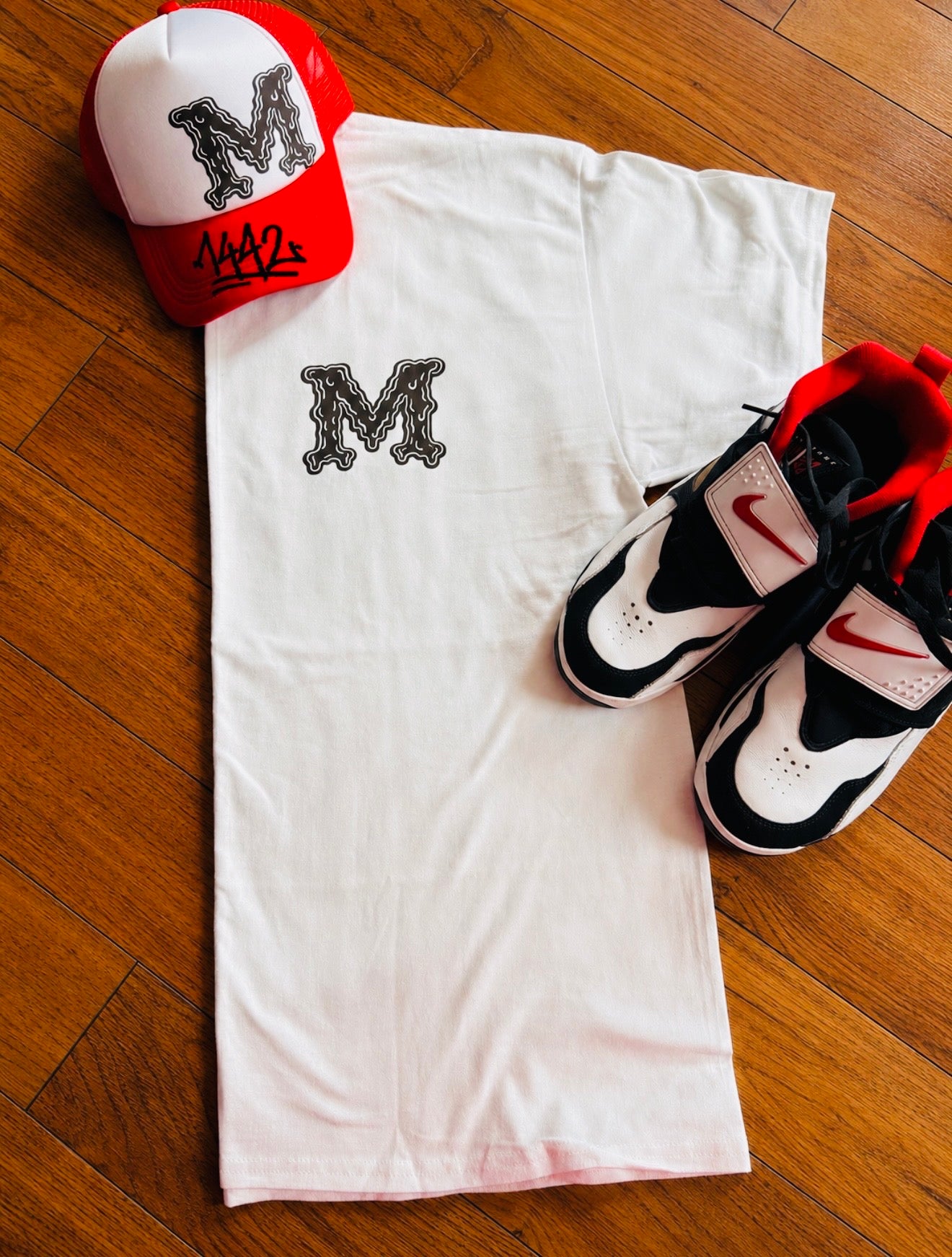 M collection trucker hat